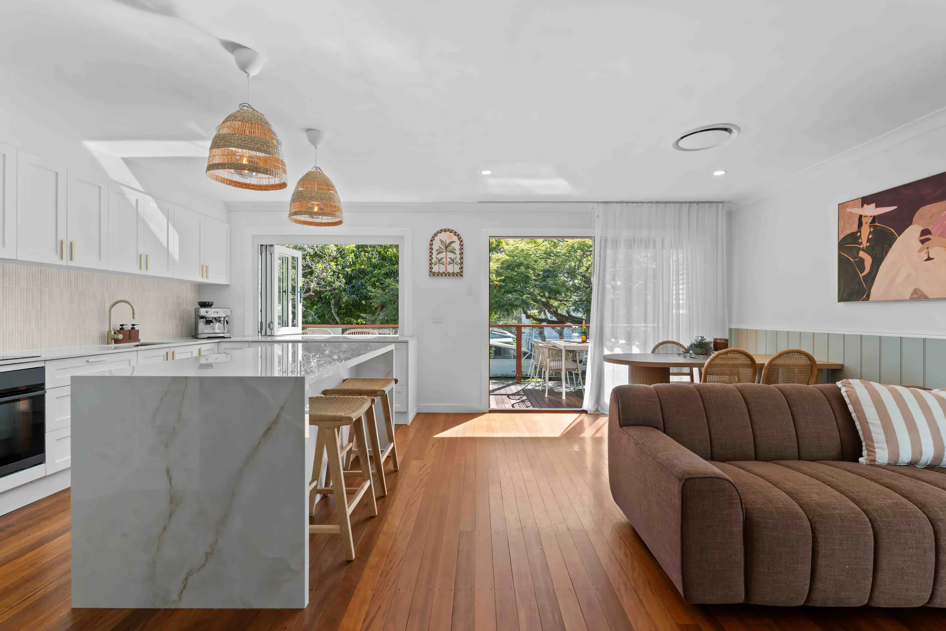 Listing photography of an open-plan kitchen and living room