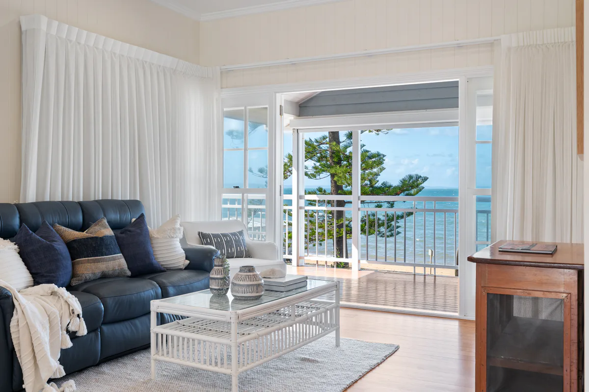 Living room opening toward a coastal outlook
